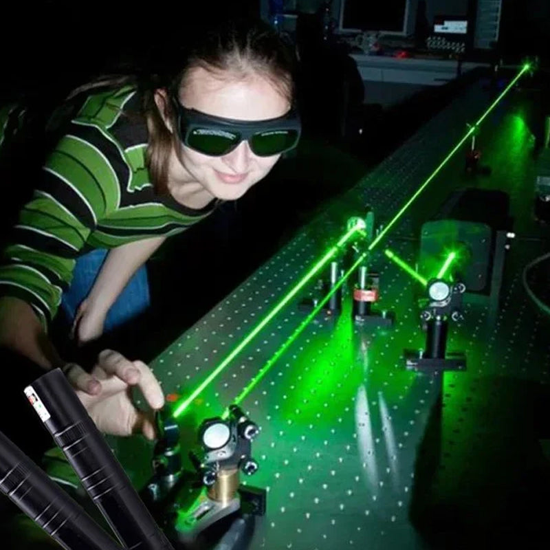 Lumière laser rouge et verte à point unique