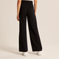 Pantalon taille haute à jambes larges et coupe ajustée