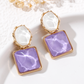 Boucles d'oreilles élégantes en forme de gouttes d'eau aux motifs géométriques