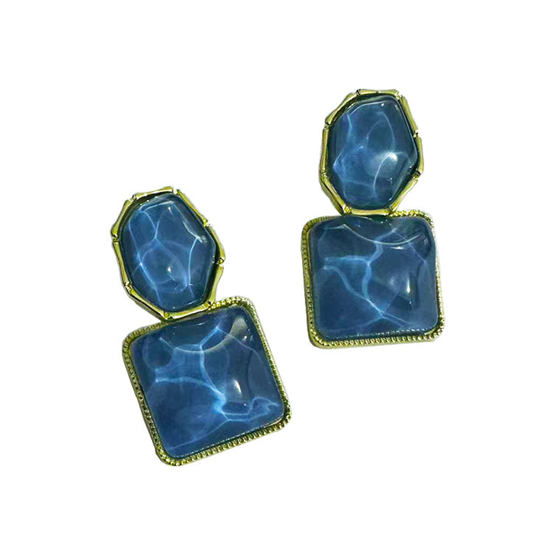 Boucles d'oreilles élégantes en forme de gouttes d'eau aux motifs géométriques