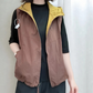 Gilet réversible à capuche et fermeture éclair pour femme