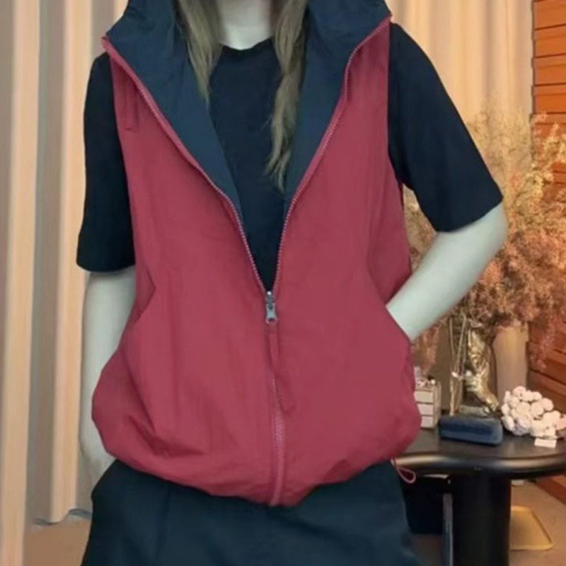 Gilet réversible à capuche et fermeture éclair pour femme